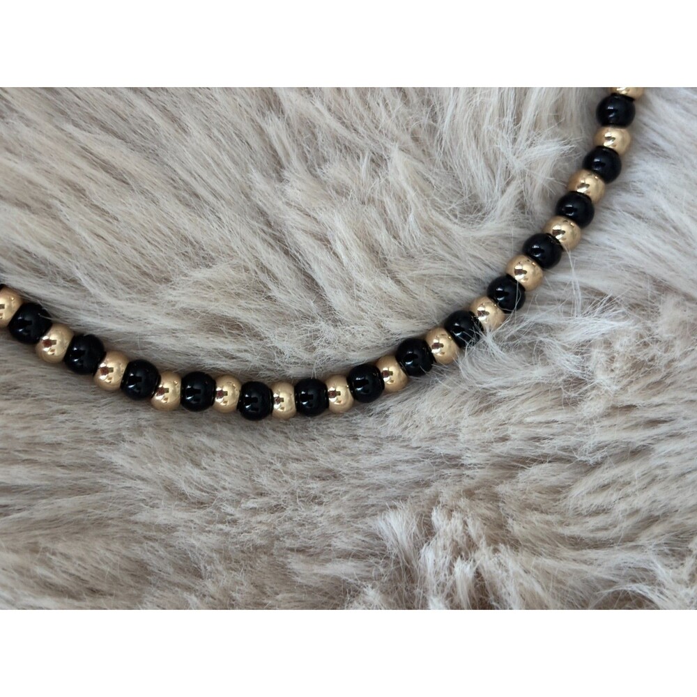 Roxanne Assoulin Black & Gold Beaded Necklace Gold Tone Macrame Slider NWOT - Picture 4 of 5